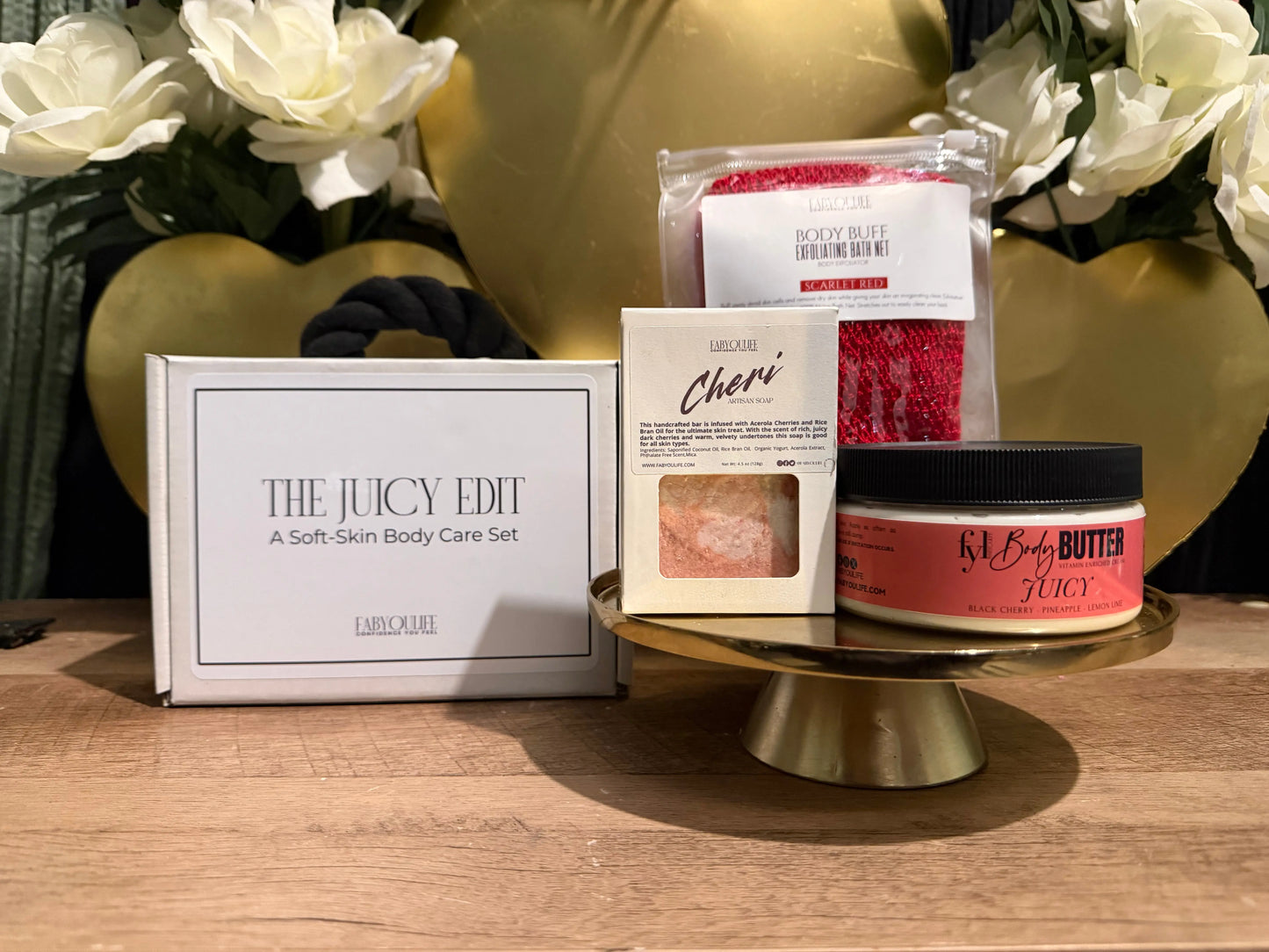 The juicy edit body care bundle. Cheri soap, red African net sponge and juicy body butter 