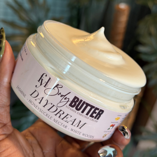 Open jar of Daydream Body Butter showing its rich, creamy texture.