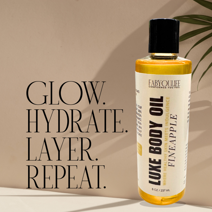 Fineapple Luxe Body Oil with pineapple, rosemary, and amber scent
