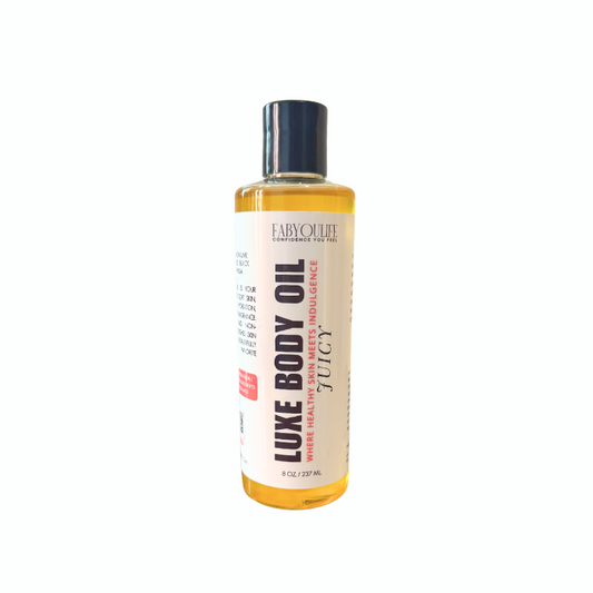 Juicy Luxe Body Oil with fruity scent of black cherry, pineapple, and orange