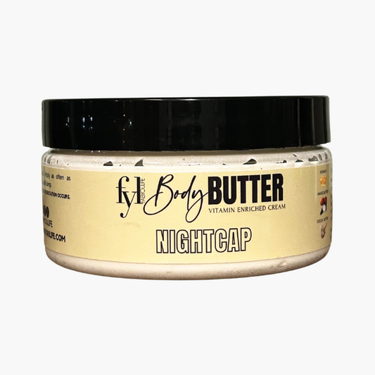 Luxurious Nightcap Body Butter in a jar with notes of coconut water, chamomile, and warm woods.